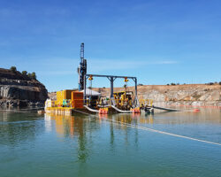 Pontoon pumping setup in FNQ mine site tailings pond.