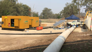 Pumps and pipe on site of river diversion install.