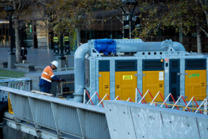 Closed canopy hire pump installed for emergency bypass pumping on the Yarra River.